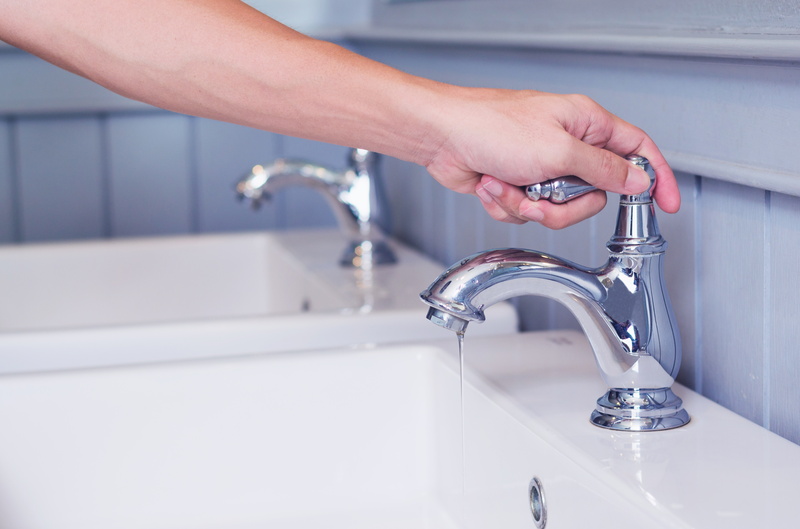 turning water off in bathroom sink outside