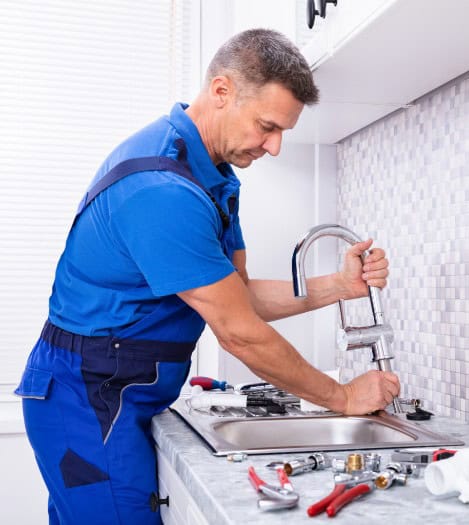 Technician installing Gas Appliance Installation